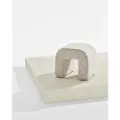 Pastill PastillOdette puff i bouclé 45x41 cmBeigeFotskamler & pufferFra Homeroom