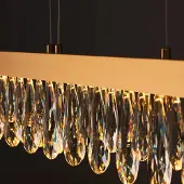 Brilliant LED-hengelampe Celestia, lengde 110 cm messingfarget krystall