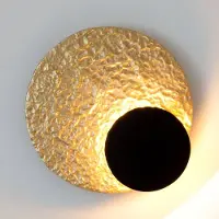 Holländer LED-vegglampe Infinity i gull, Ø 26 cm