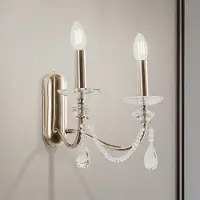 Lucea Adone vegglampe, 2 lyskilder, messing, høyde 30 cm, krystallglass