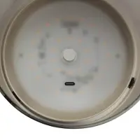 Brilliant LED-bordlampe Lumeo, Ø 13 cm, messingfarget/røykgrå