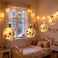 Mtp Products LED-lyskjede med julenissemotiv og gjennomsiktige kuler – 10 varmhvite LED-pærer – 2m